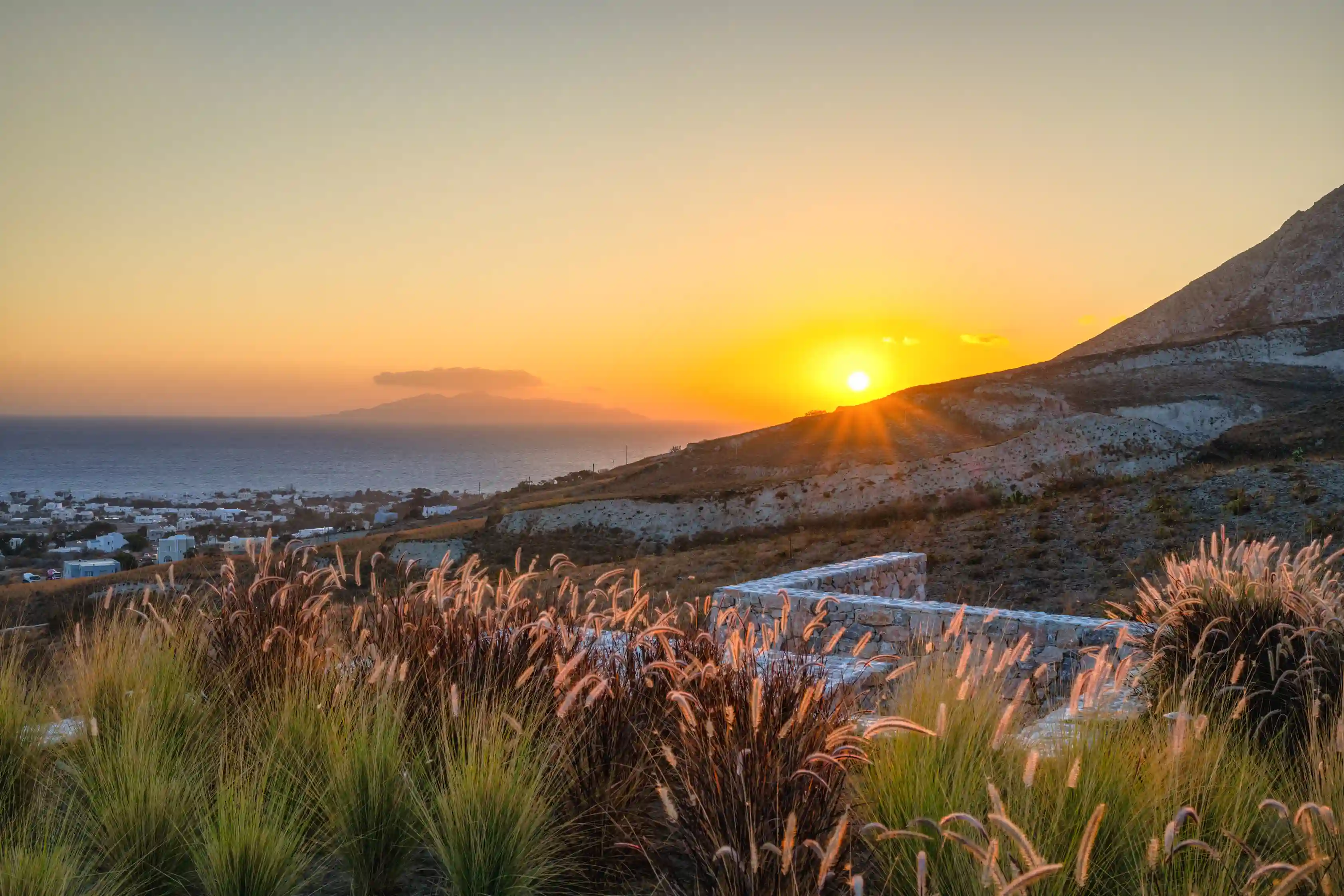 Felicity Cave Villas garden at sunrise - Natural landscape with sea and mountain views in Santorini