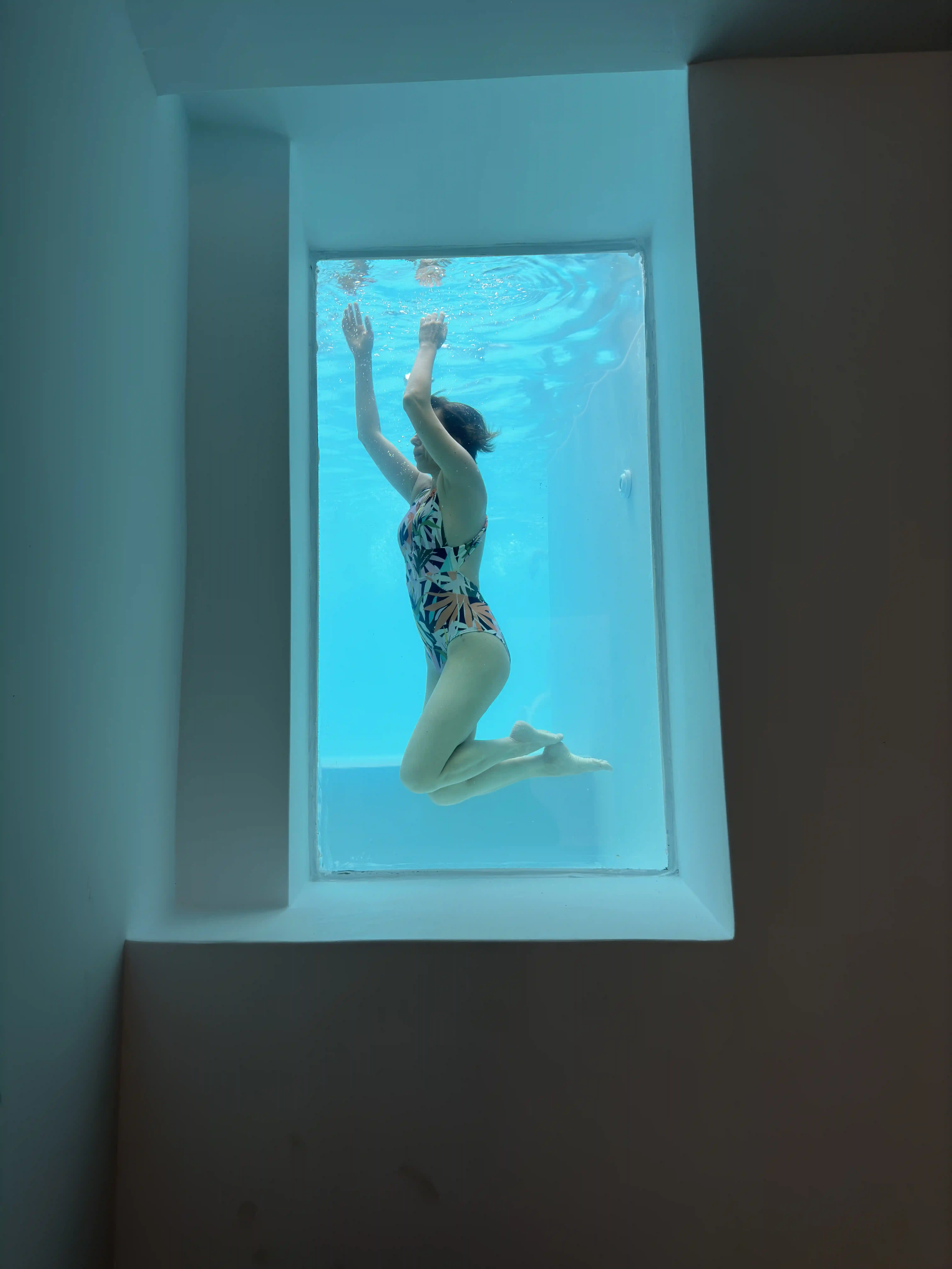 Superior Cave Villa luxury pool with submarine windows - Unique underwater viewing feature