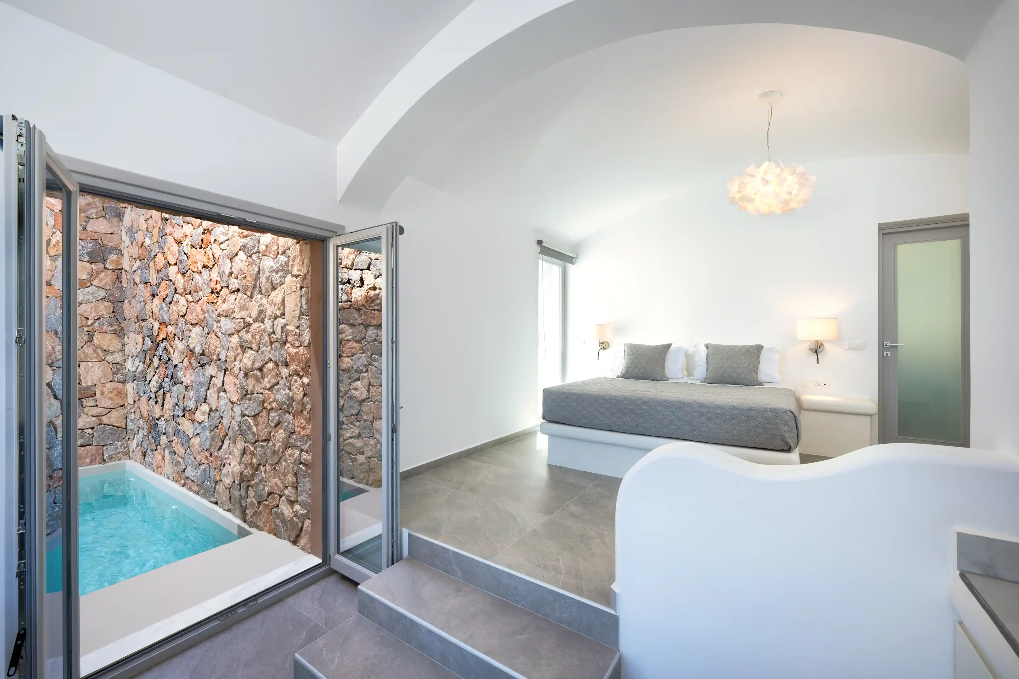 Superior Cave Villa modern living area with pool access - Contemporary design with bedroom space