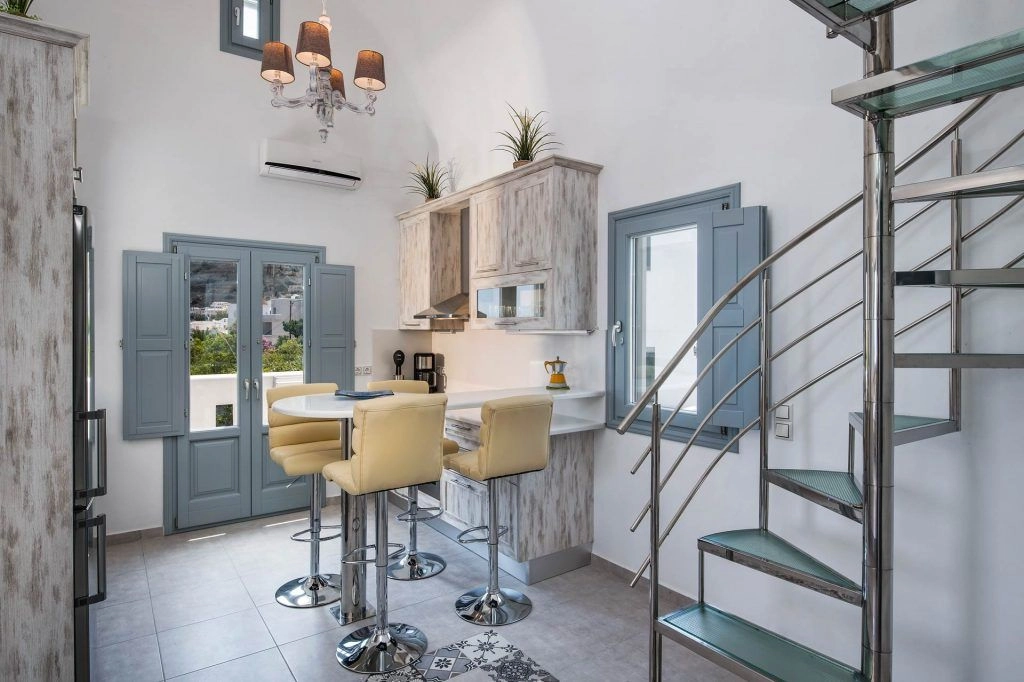 Villa Grégoire kitchen with balcony access - Modern kitchen opening to outdoor terrace with views